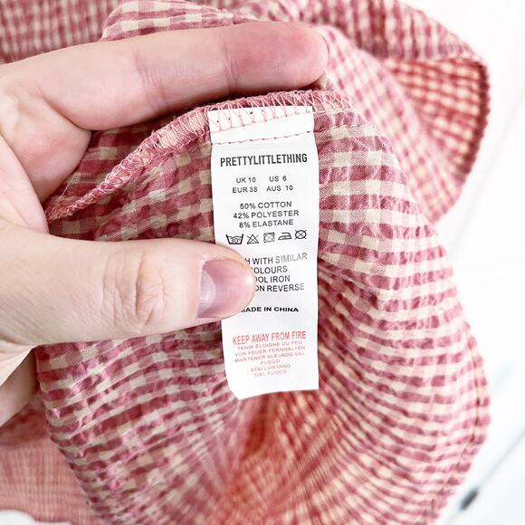 PrettyLittleThing Pink Gingham Print Crinkle Underbust Detail Tiered Smock Dress - Picture 5 of 8